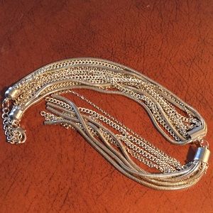 Mika Tassels silver detailed in silver EUC